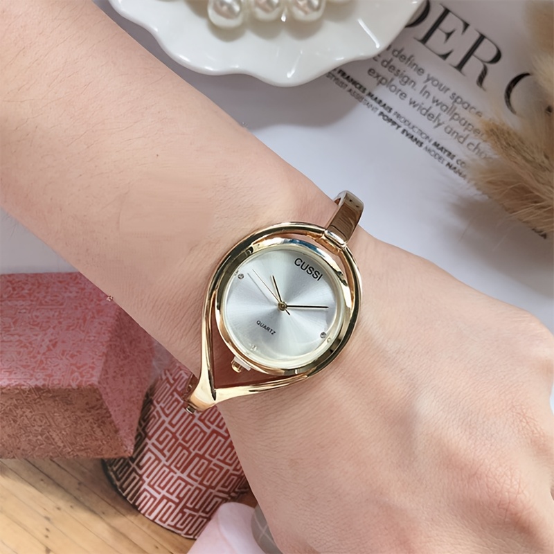 elegant womens quartz wristwatch with hollow out design round alloy case and band bracelet details 3