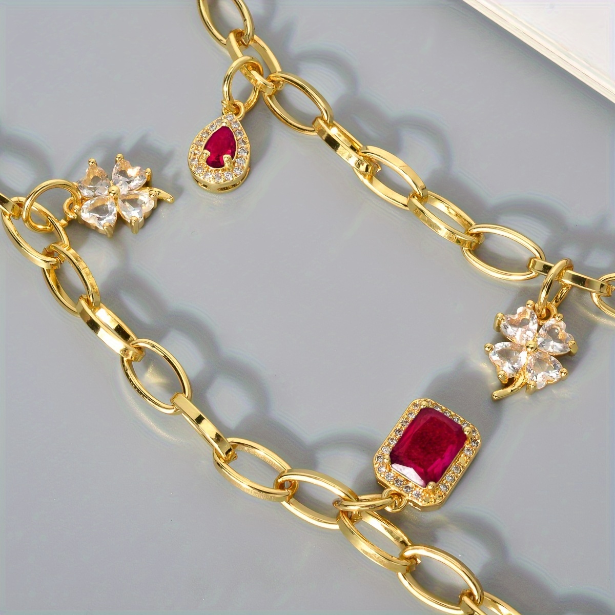 Adjustable Copper Necklace with Four Leaf Clover & Red Cubic Zirconia Pendant