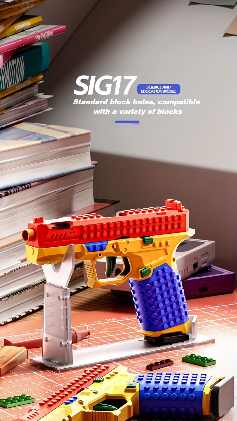 an   model of a building block gun featuring a realistic   system this safe and non toxic stem toy requires no batteries and   in a vibrant red yellow and blue color scheme making it   christmas birthdays Product details 0