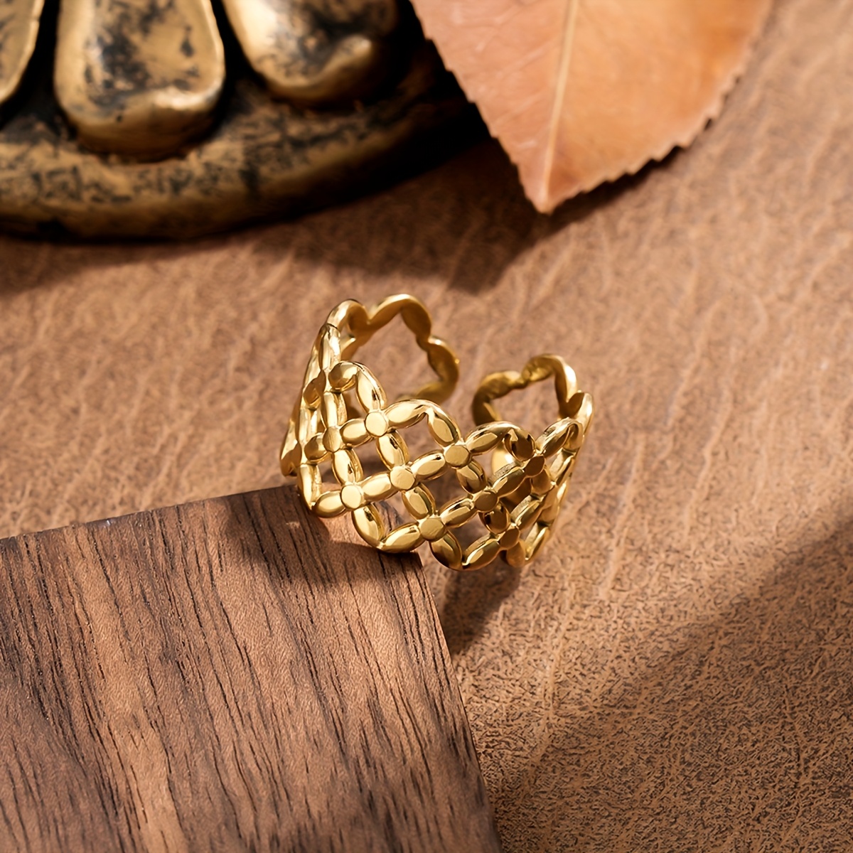 A Ring With Hollow Lines And Wide Opening, Made Of And Non-fading Material. Suitable For Daily Wear, As Well As For Gift- On Special Occasions Or For Family Celebrations