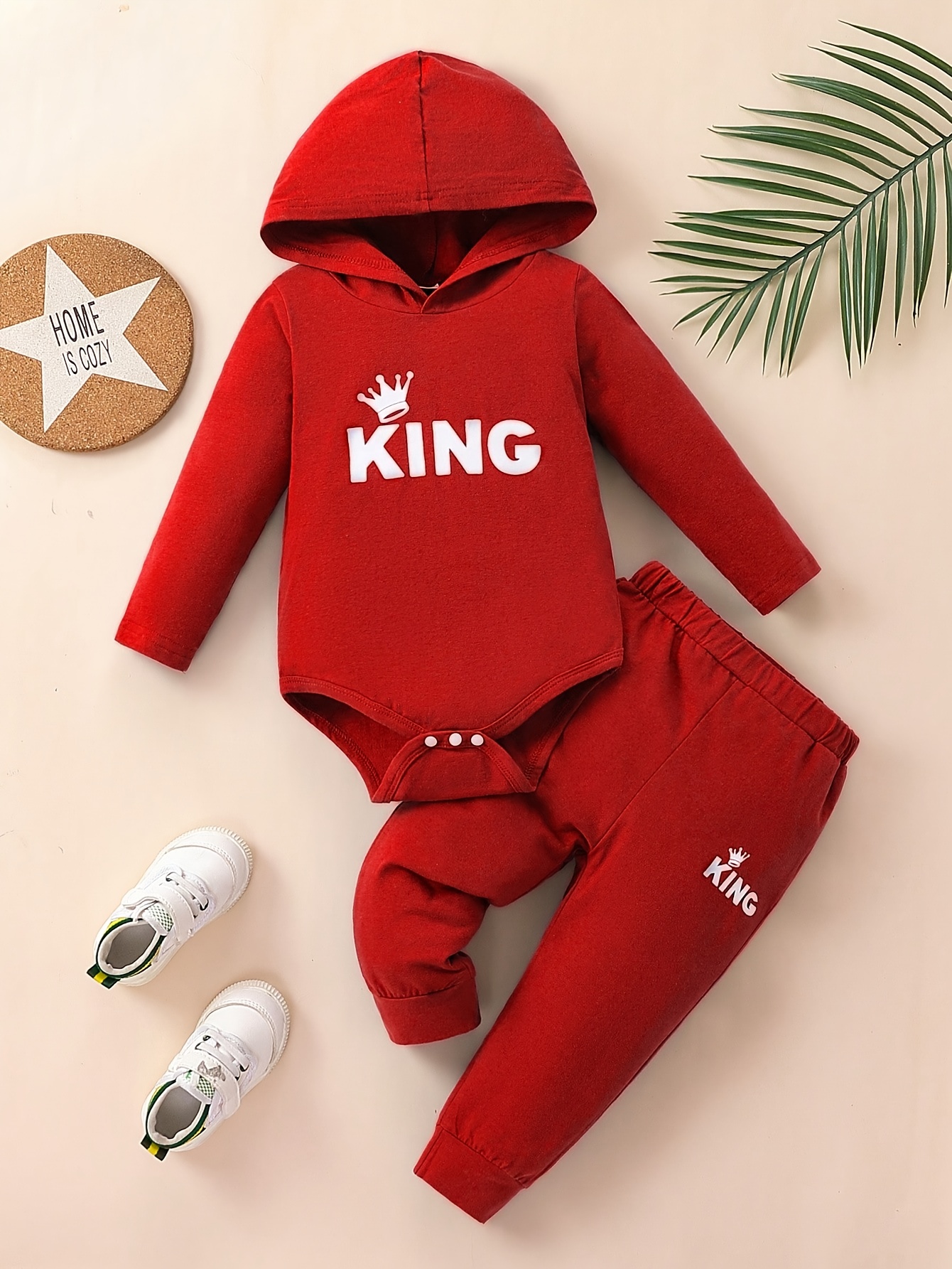 Effenkleurige romper met capuchon en lange mouwen