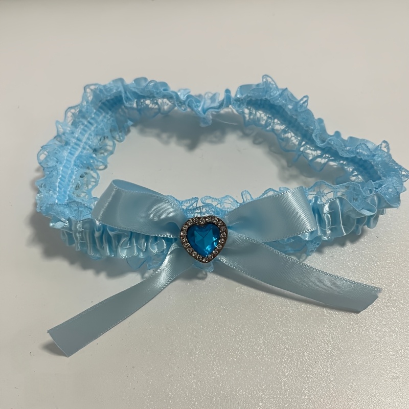 Image of Elegant Blue Lace Wedding Garter With Bow And Rhinestone Heart Decoration - A Bridal Leg Accessory For The