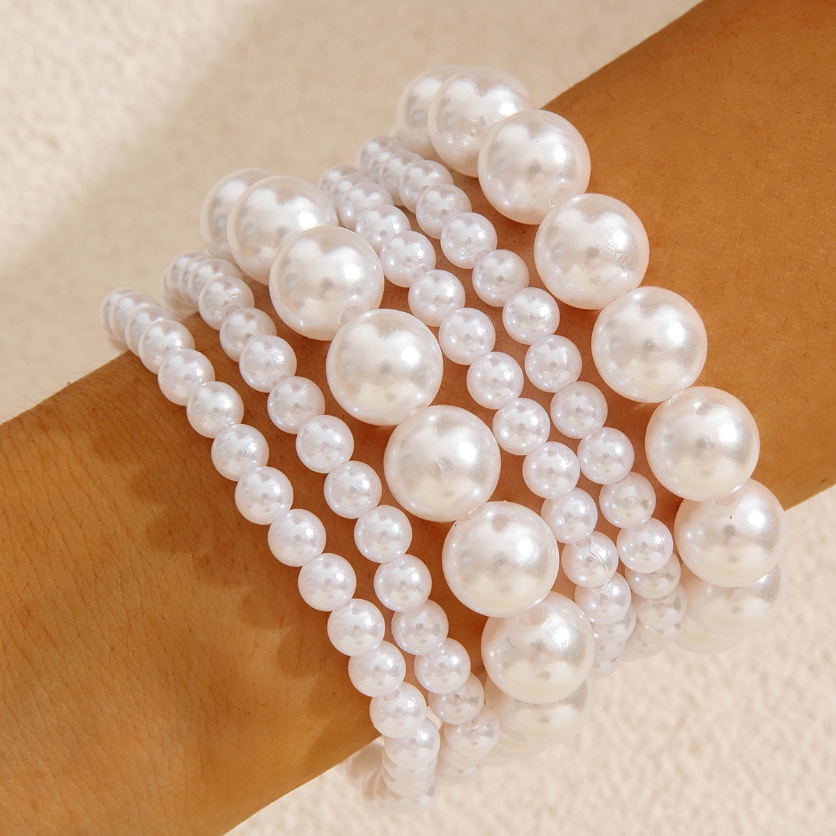 TEMU Juego de 6 piezas: Pulseras lujosas y elegantes de perlas de con cuentas, apilables con cordones elásticos. Un juego de joyería de versátil