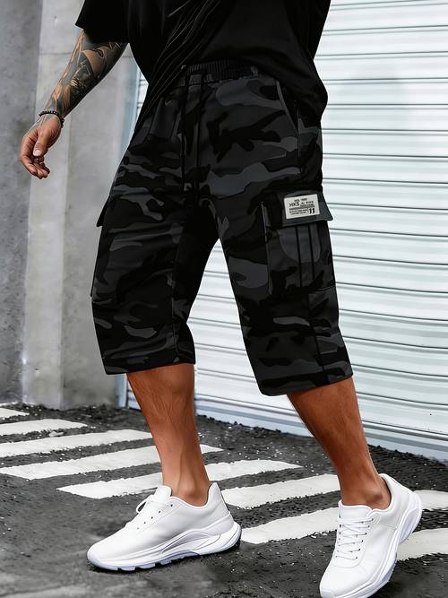mens camouflage cargo capri pants featuring a camouflage pattern relaxed fit adjustable waist drawstring and multiple pockets casual and versatile mens shorts are suitable for everyday leisure outdoor activities workouts