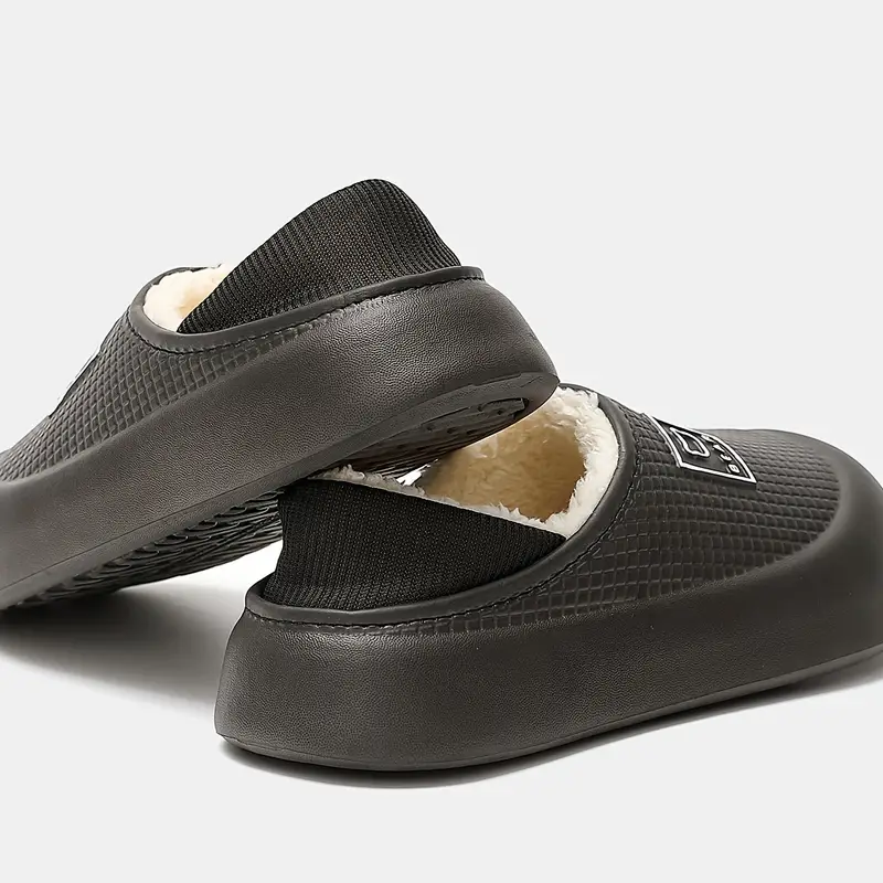 womens winter 2025 new arrival elegant slip on slippers with thick plush fleece lining warm cushioned insole black hand clean shoes cozy indoor footwear textured strap detail durable footwear construction Product details 3