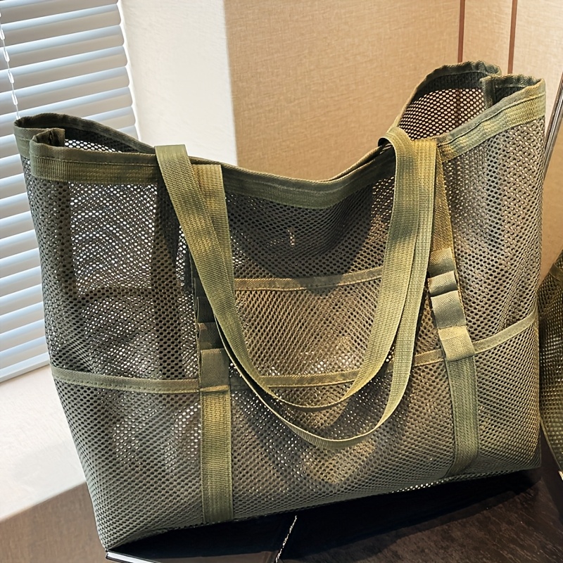 perfect   mesh tote bag wide shoulder strap durable synthetic material ideal for beach shopping and fitness vacation essentials stylish mesh bag durable handle bag