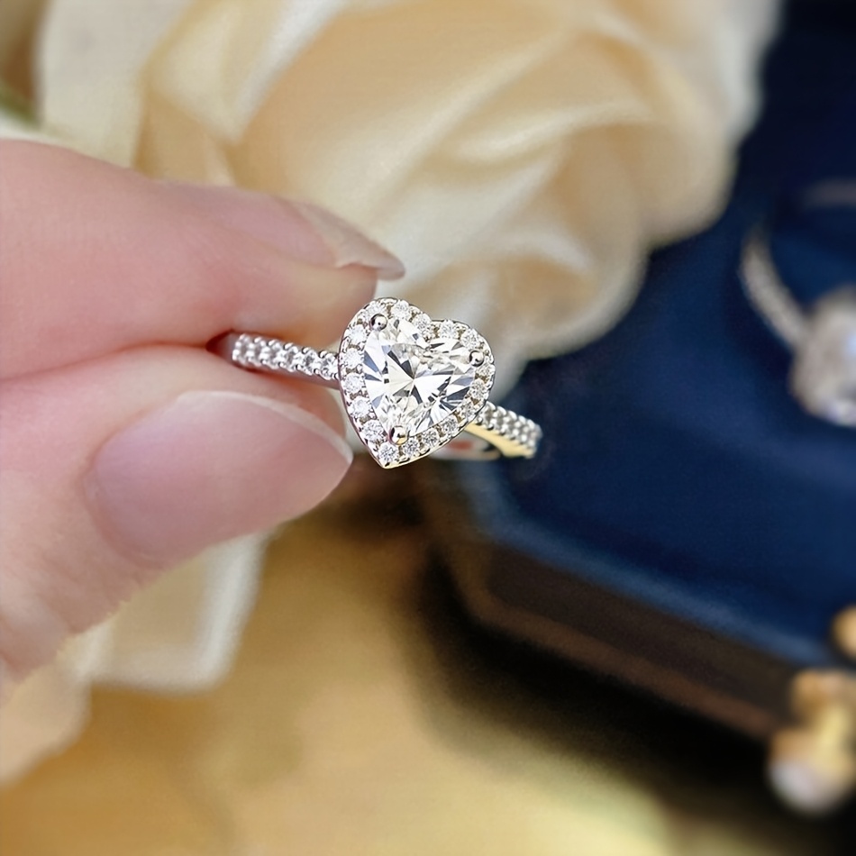 TEMU Classic And Stylish Women's Adjustable Ring With A Heart-shaped Cubic Synthetic Zirconia Centerpiece Set In Copper. In Classic Pink, Blue, And
