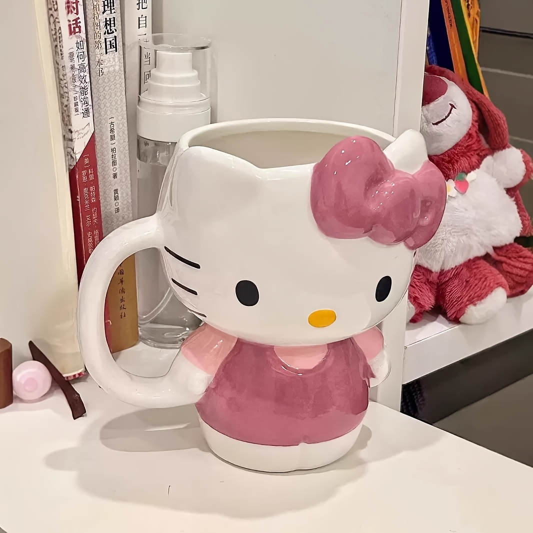 Sanrio Hellokitty-Novelty Ceramic Mug - BPA Free, 16.9fl.oz Large Capacity Coffee Mug, Drinking Mug, Dishwasher Safe - Can Be Used As A Penny Bank, Vase, Suitable for Work, Student Rewards, Birthday Gifts, Housewarming Gifts