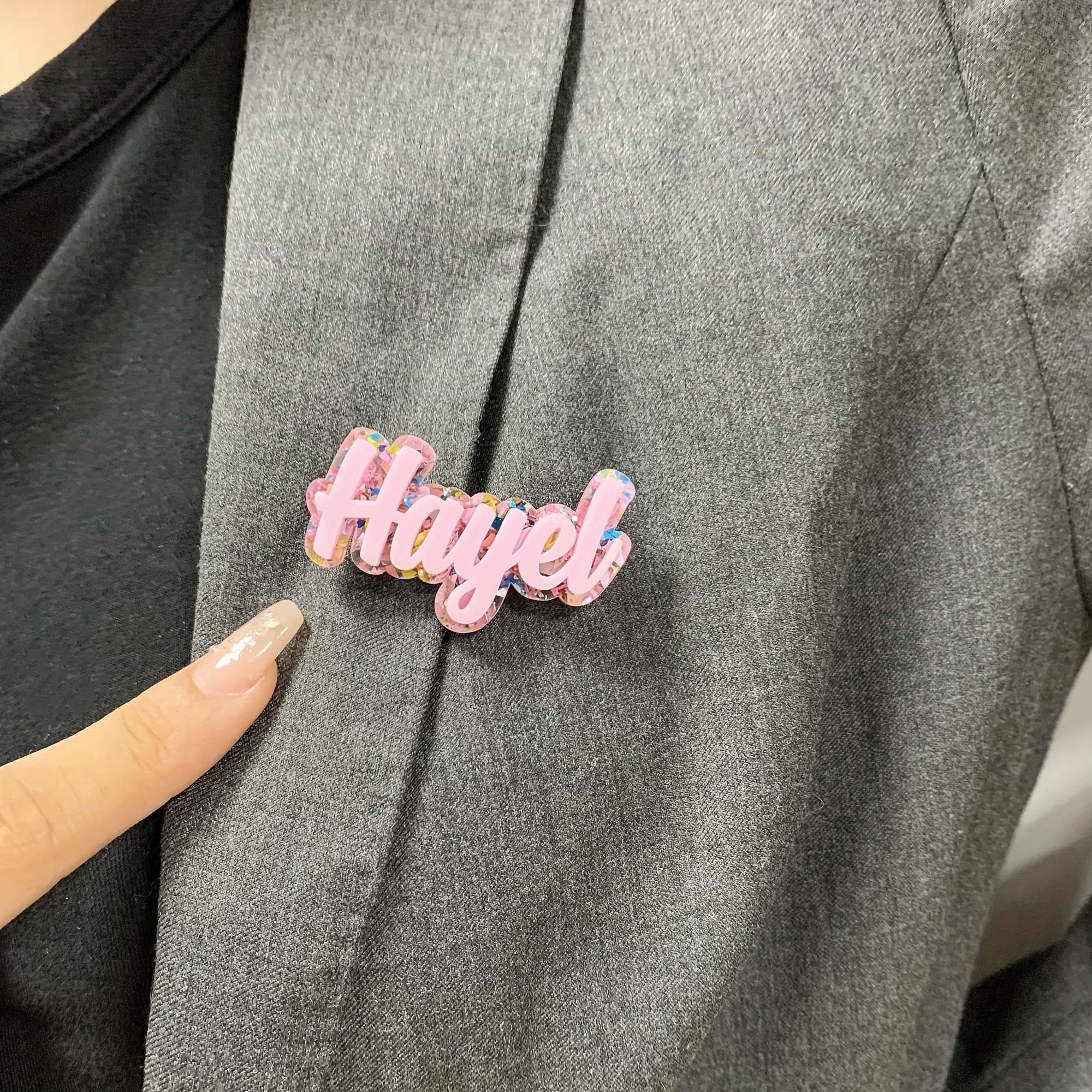 

A Customizable Acrylic Name Brooch With A , Featuring Purple And Pink In A Double-layered Plaque, Making It A Perfect Gift At Parties Or An For Christmas Celebrations.