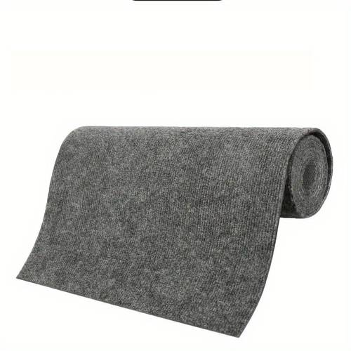 a roll of area rug featuring peel and stick carpeting that has a self non slip surface soft cushion carpet tiles are ideal for kitchens bedrooms living rooms and used indoors and outdoors