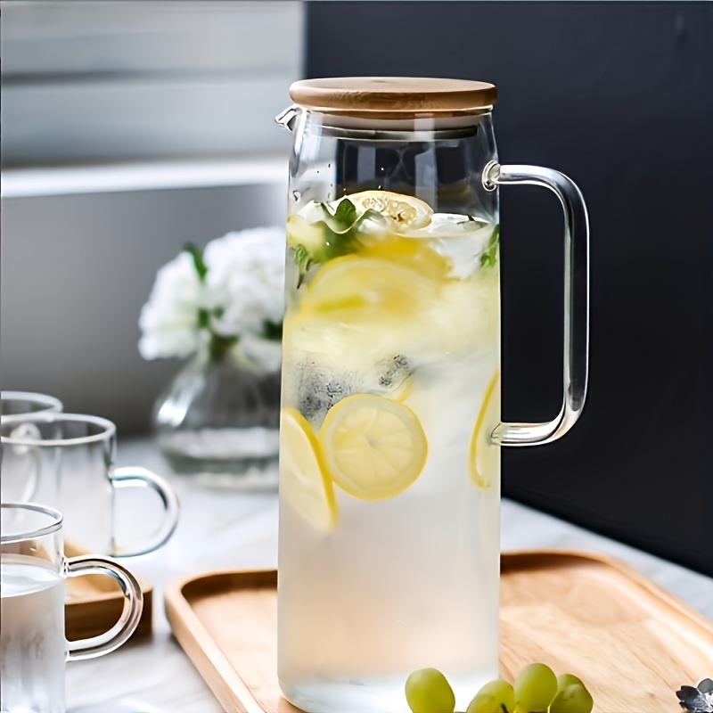 

High Borosilicate Glass Cold Water Pitcher, Straight Body Cool Water Jug For And Chilled Boiled Water, With Bamboo Lid And Lemon Infuser.