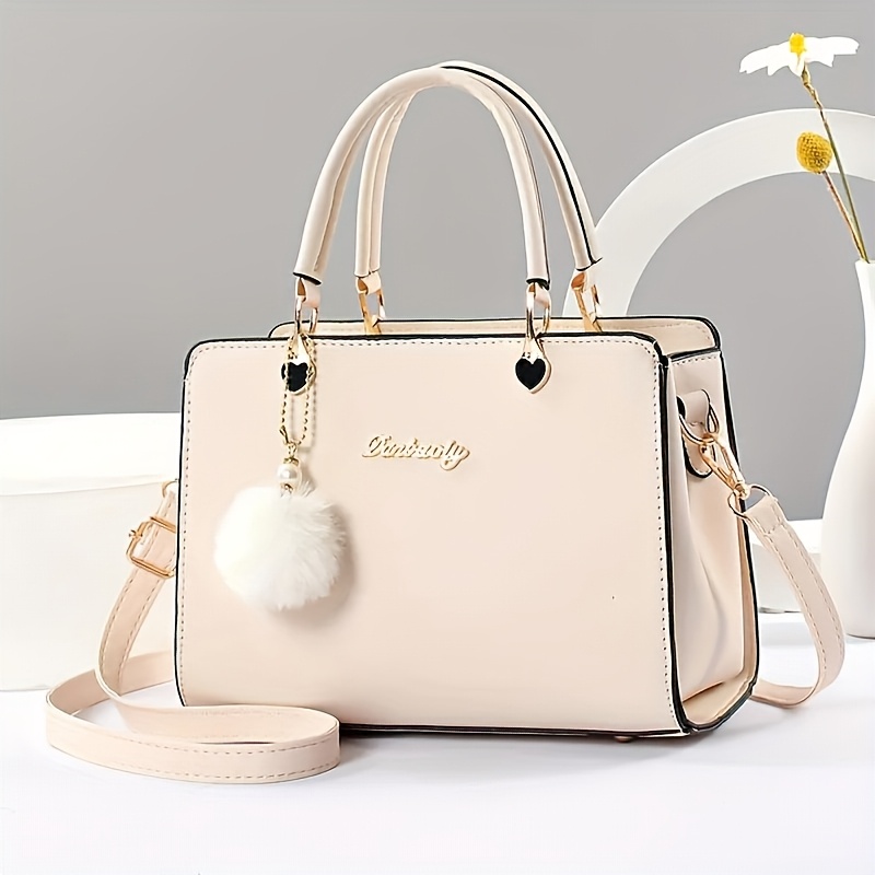 

1pc Chic Solid Color Women’s Handbag With Adjustable Crossbody Strap, Design, And Fluffy Pom-pom Charm – Elegant Satchel In Cream/black, Use, Stylish Accessory | Charm Accent | Stitching Detail