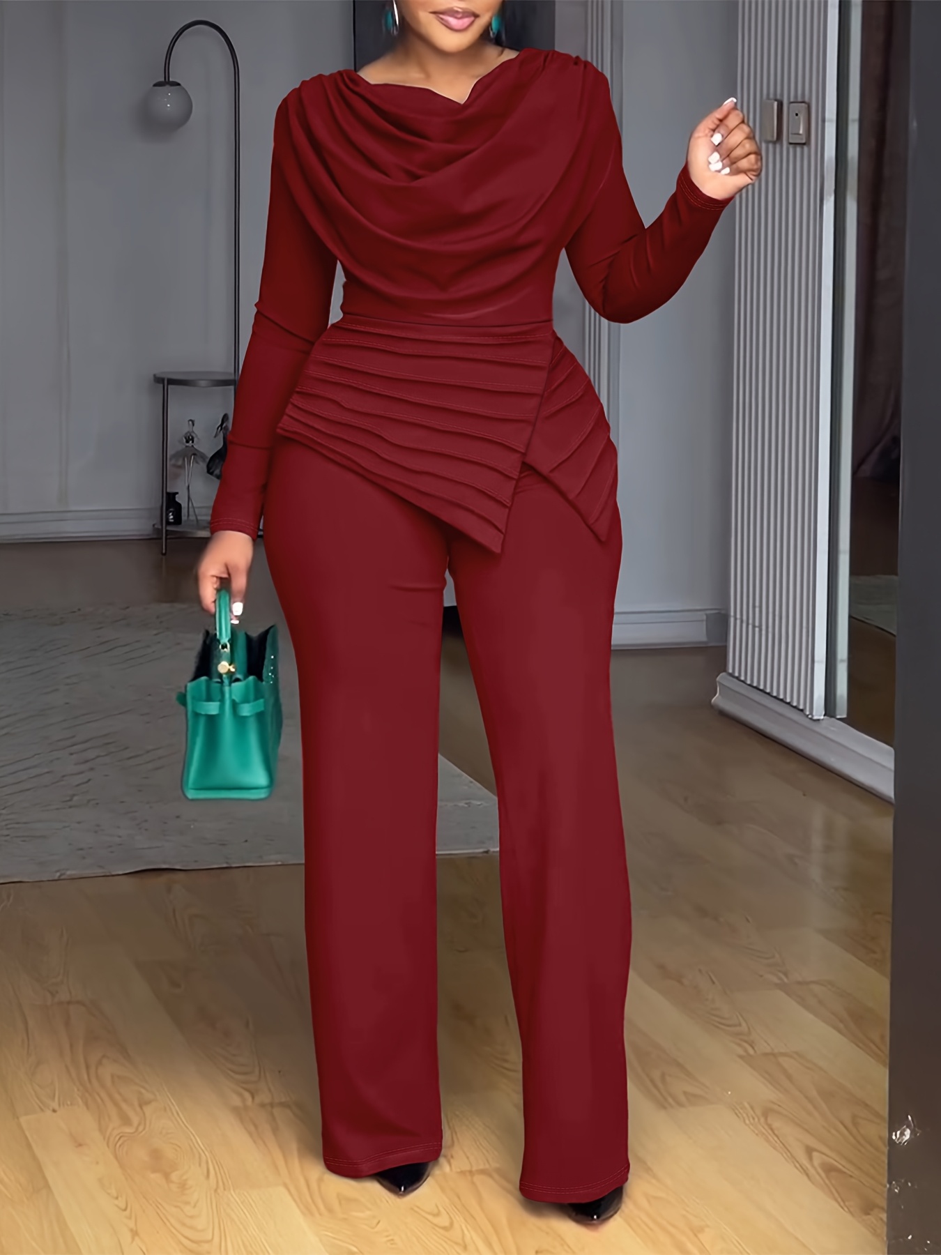 A Long-Sleeved Top with a Gathered Design And a Waist-Cinching Feature, Paired with Wide-Leg Jumpsuits