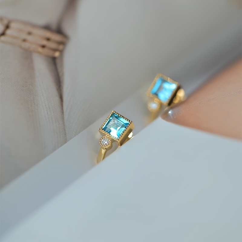 Women's Minimalist Square Aquamarine Blue Zirconia Huggie Earrings