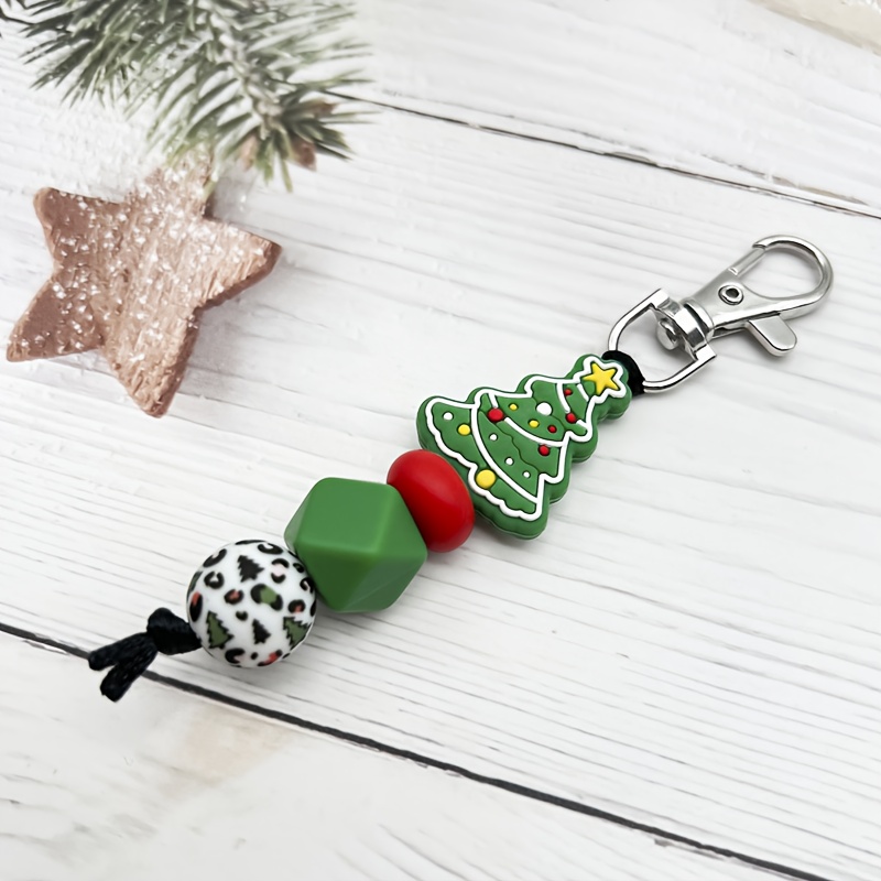 TEMU Un porte-clés de Noël avec des perles, aux couleurs classiques , d'un charm de sapin de Noël ludique et de perles à imprimé léopard élégant.