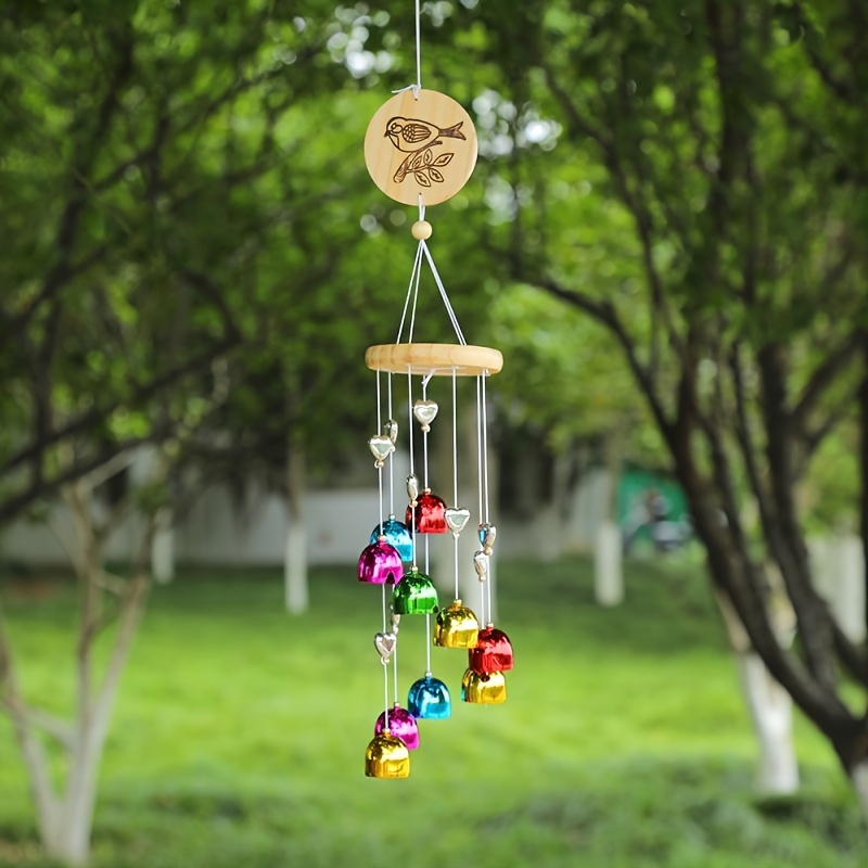 

A Bell Wind Chime With A Hummingbird Motif Is Suitable For Patio Decoration