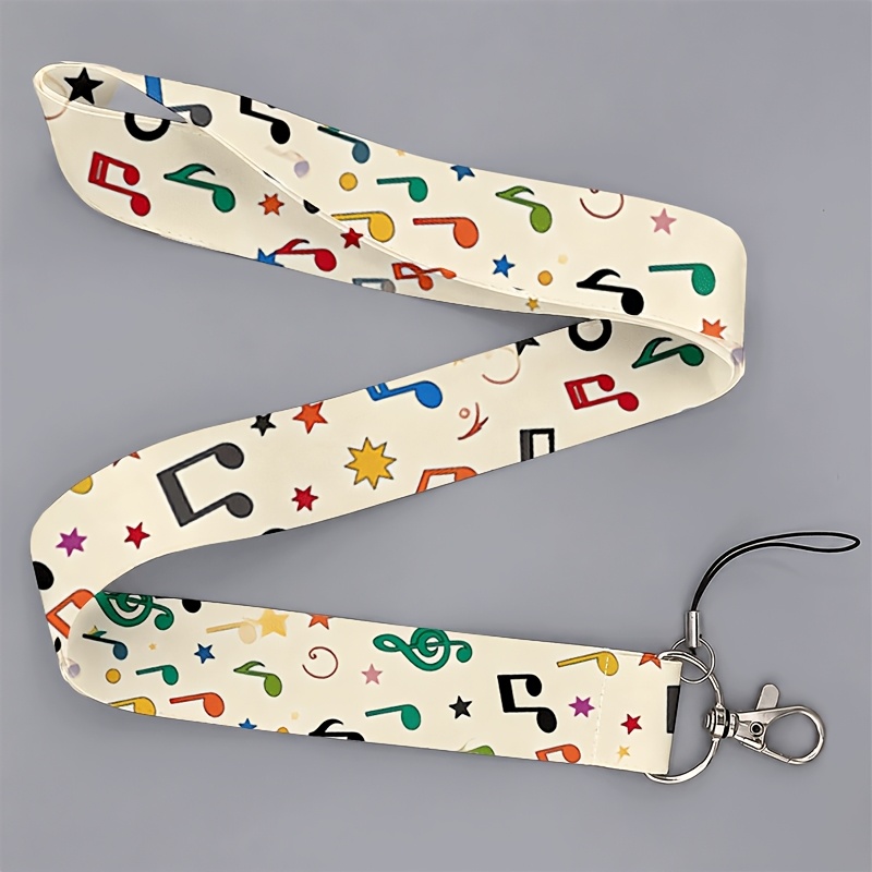 TEMU Cordón 2D de 1 estilo con estampado colorido de y estrellas con soporte para teléfono - Compatible con smartphones, tabletas, llaves,