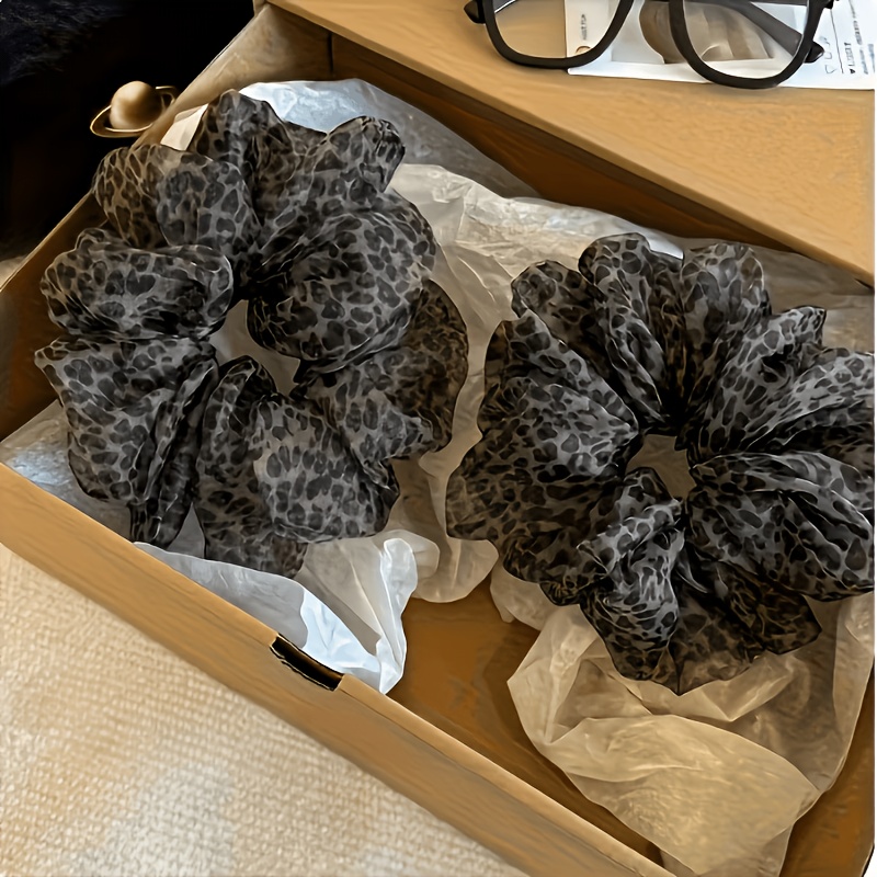 TEMU Lot de 2 chouchous à imprimé léopard, accessoire de cheveux décontracté et amusant pour femme pour faire un chignon
