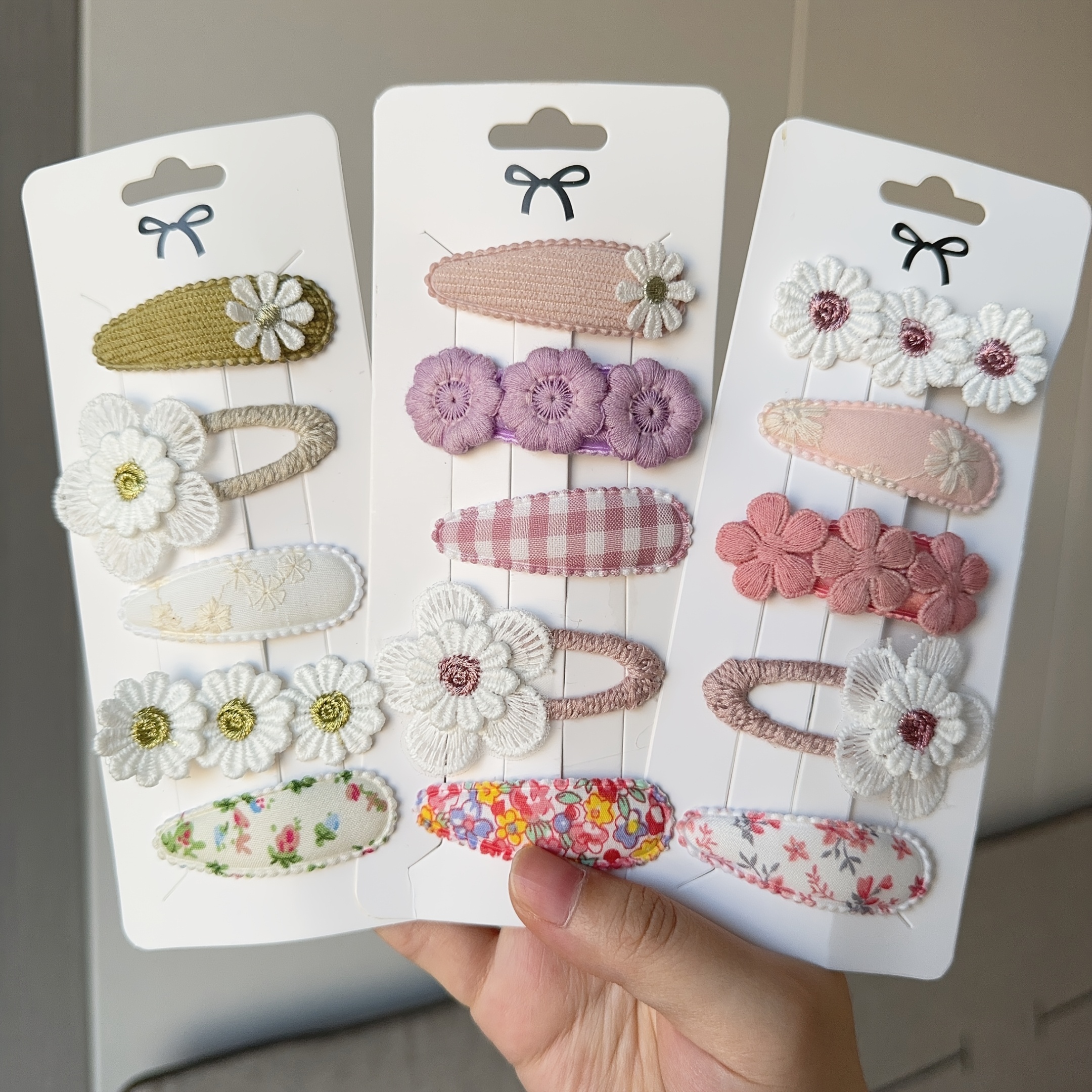 a new set of 5 cute hair clips for women featuring a solid color and stylish     hair additions