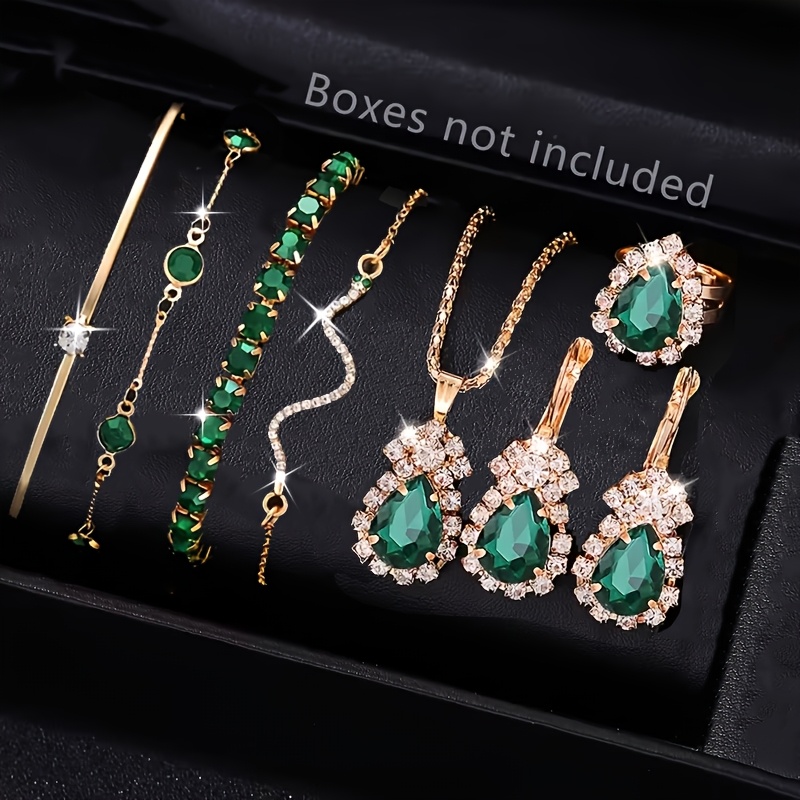 TEMU Un set de 7 piezas que incluye pulseras, collares, aretes y anillos, adornados con diamantes de verdes, que una pulsera de serpiente y un diseño