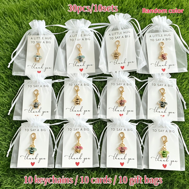 TEMU 30pcs/10 Sets Random Color Cute Bee Drip Oil Keychains, Includes 10 Keychains + 10 Cards + 10 Mesh Bags, Alloy Pendant Charms, Simple Bag