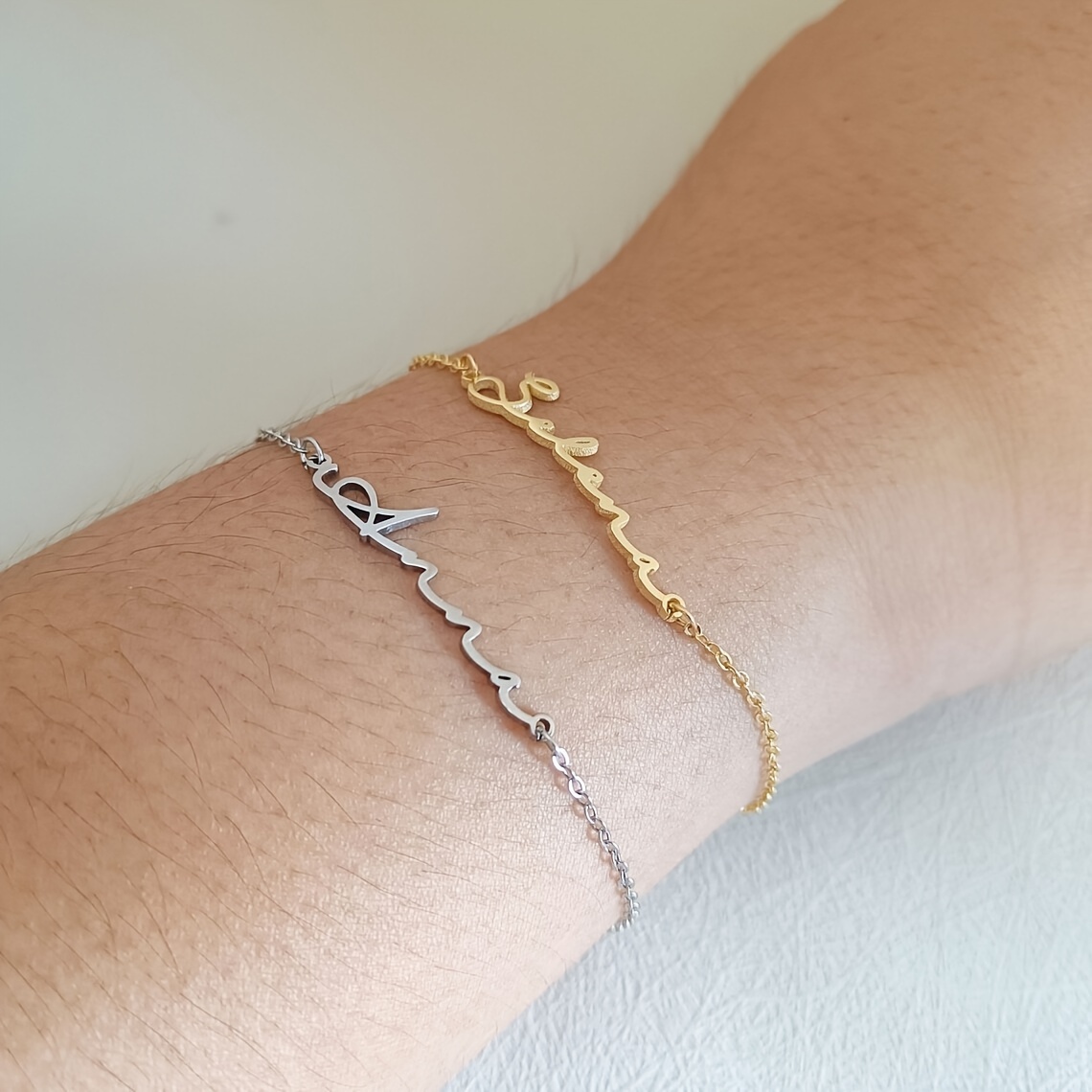 elegant custom golden stainless steel name bracelet for women -   in cursive script, ideal for casual attire &   like birthdays, holidays, weddings & graduations details 0