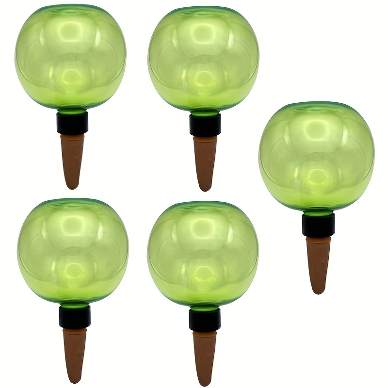 A Set Of -large Self-watering Globes, Specifically Designed For Top Watering. Plastic Water Globes Provide A Slow Release Of Moisture And Inserted Into Clay Pots As A Spike-style Watering System