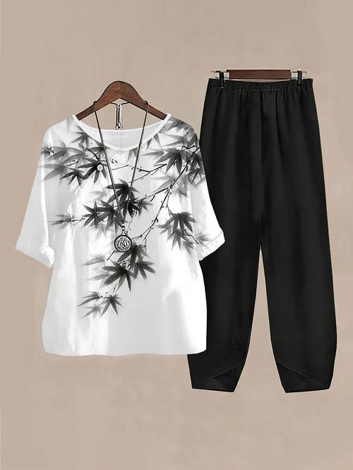 wilderness - frühling/sommer neues bambus-print rundhals-einteiler mit kurzarm und hose bequemes casual t-shirt set