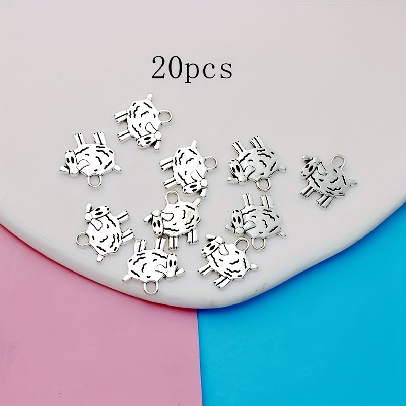 Image of Set Of 20 Small Sheep-themed Supplies Made Of Alloy With An Antique Silvery End, Perfect For Jewelry Such As Necklaces, Earrings, Keychains, Phone Straps, And Bag Embellishments