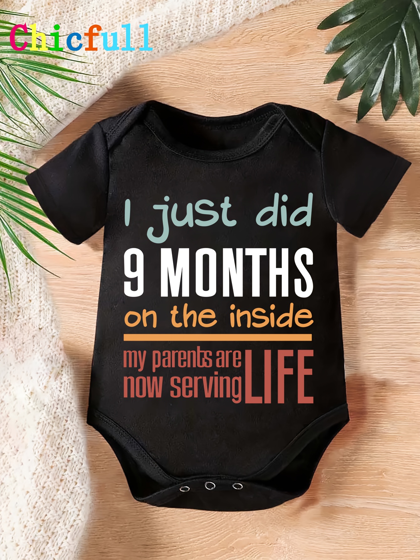 funny baby onesie sold on Temu Canada