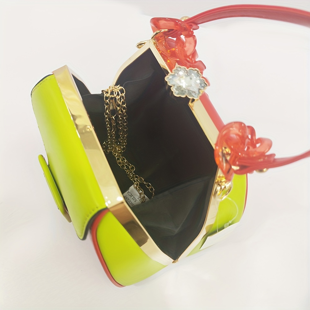 Stylish Two-Tone Round Handbag Made of Durable, Featuring a Detachable Acrylic Chain And Snap Closure. This Versatile Handbag Is Perfect for Both Parties And Everyday Use.
