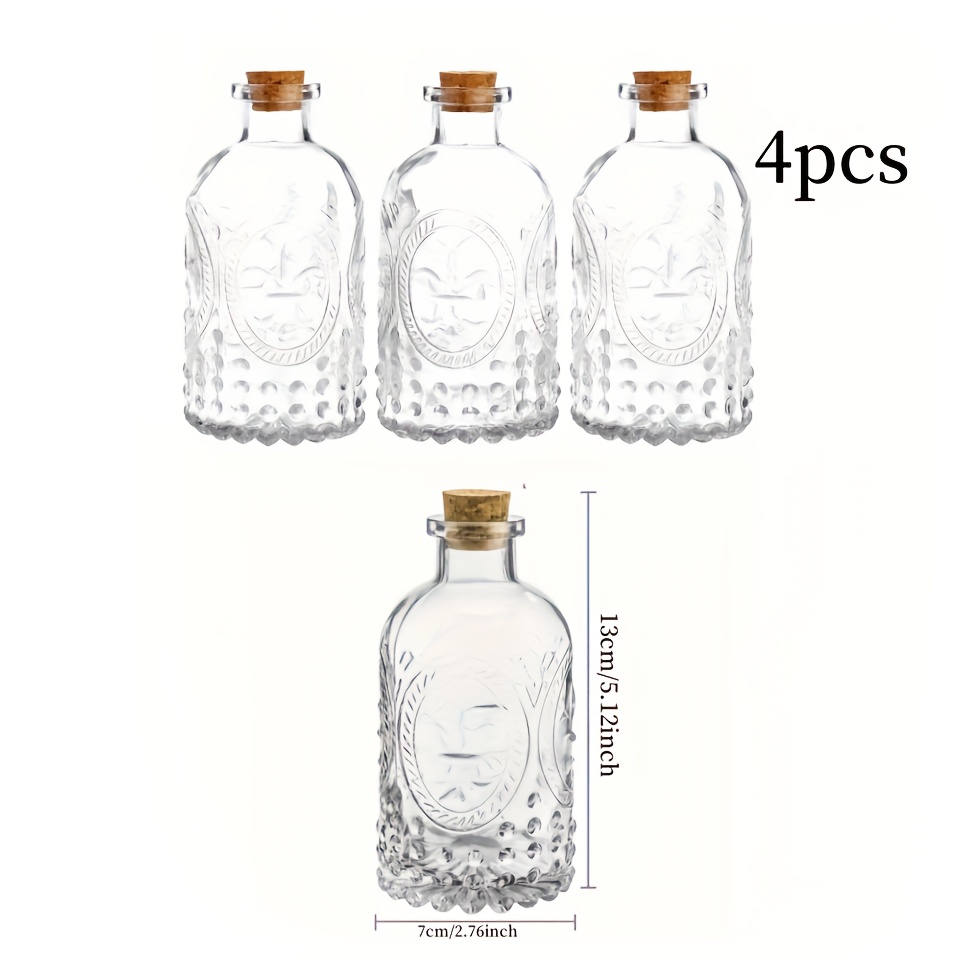 Clear Glass Bottles Featuring A Vintage Embossed Design, Complete With Cork Lids, Perfect For Use As Apothecary Flower Bud Vases