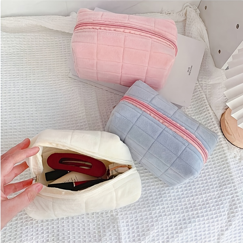 a cosmetic storage bag designed with a chic and minimalist   for students and women for travel storage makeup bags vacation organizers and large capacity cosmetic cases   suitable for lipsticks brushes skincare products phones   and small items making it versatile for home use gifts and vacations featuring a bohemian style Product details 0