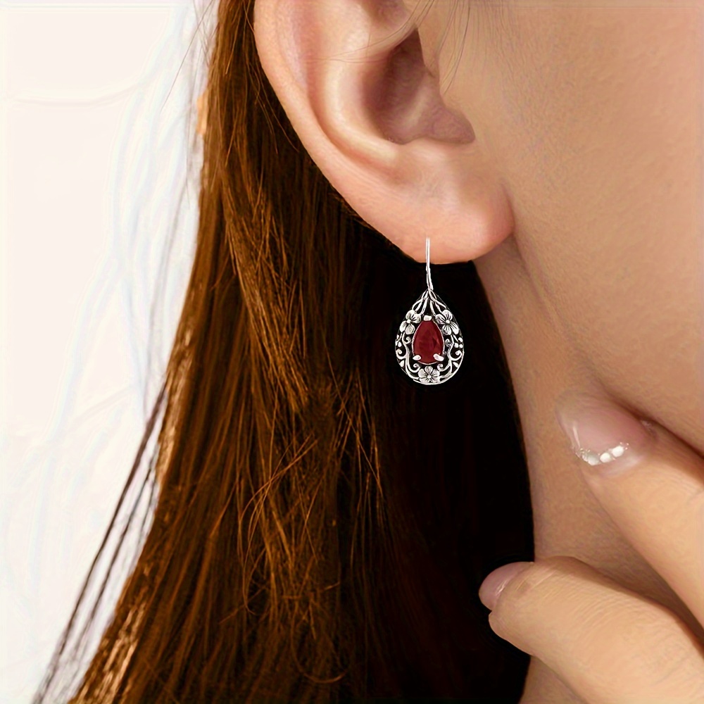 

A Of Patterned Red Artificial Pendant And Stud