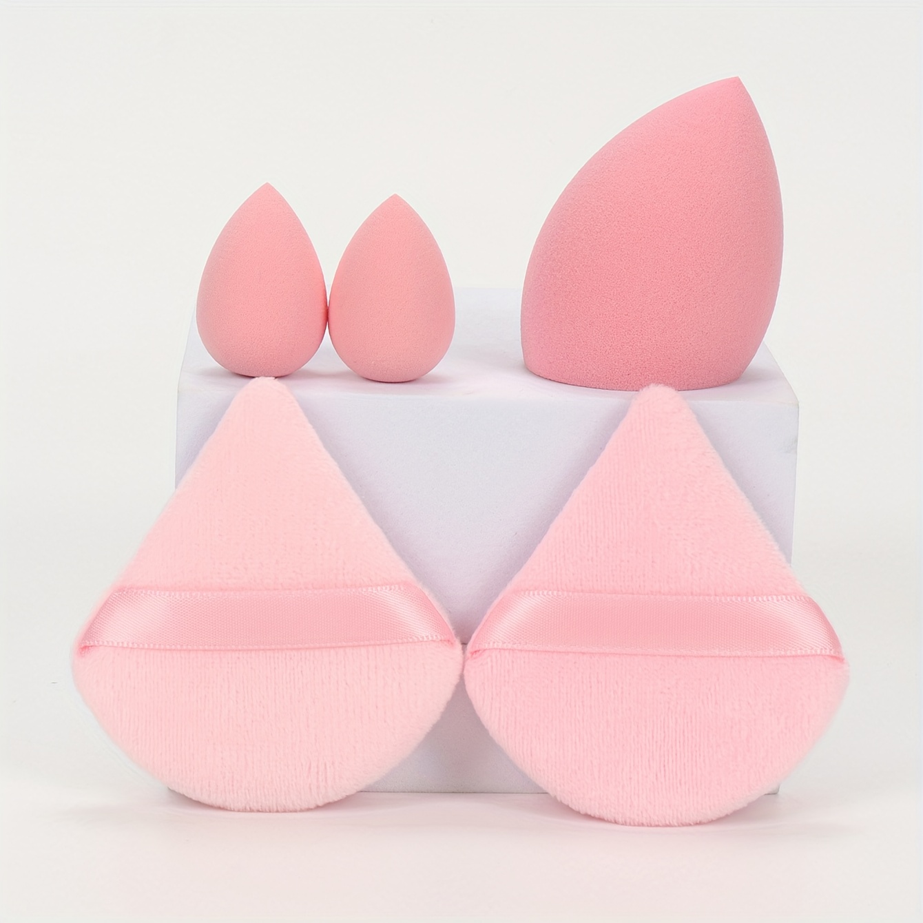 TEMU Juego de 5 esponjas de maquillaje, una herramienta versátil que a una aplicación de base de maquillaje más uniforme y sin costuras, previniendo