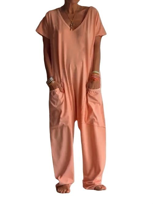 a womens loose fitting romper with pockets in a single color