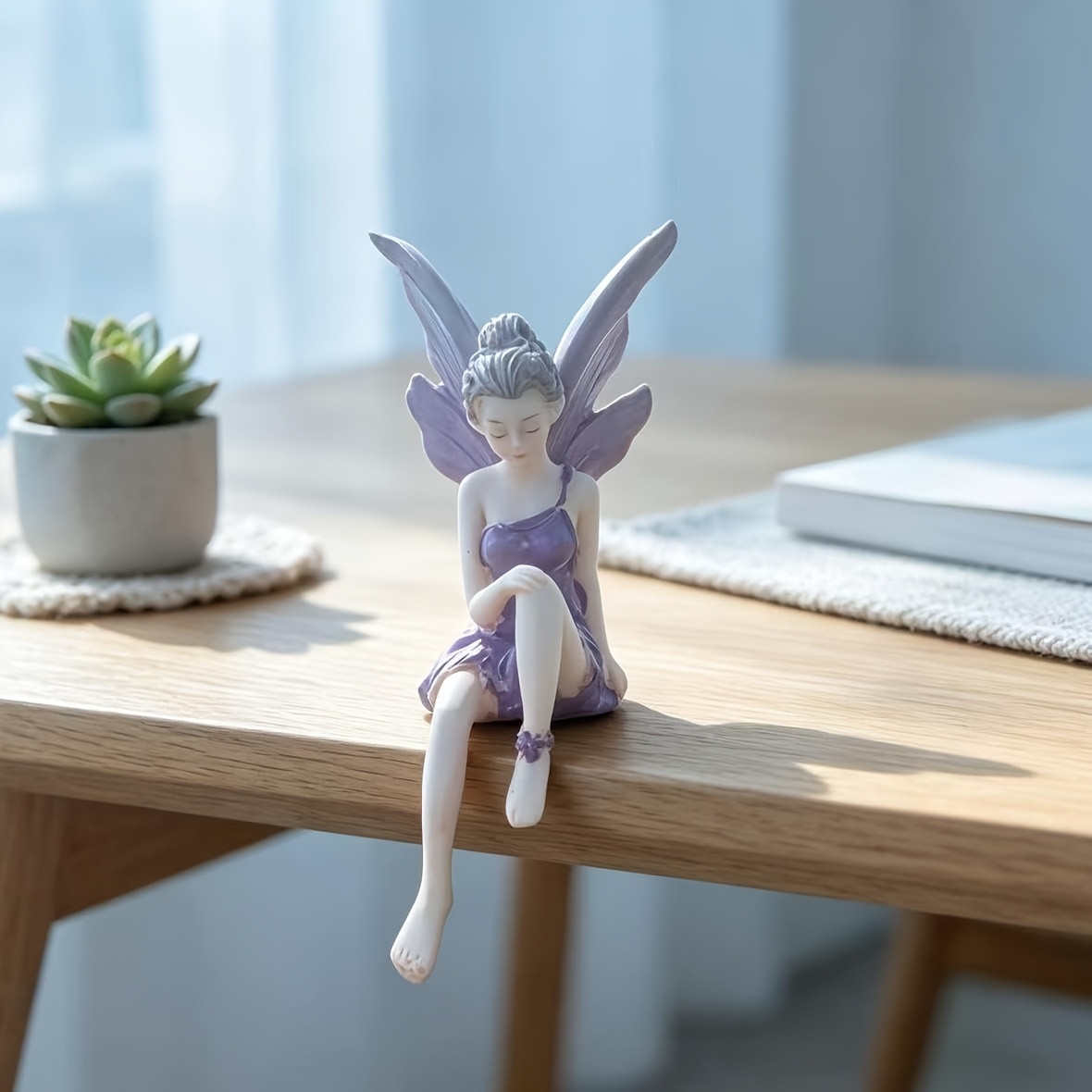 TEMU 1pc Sculpture de jardin féérique en résine, Statue de fée ailée fantaisie violette assise pour la décoration intérieure et la décoration de