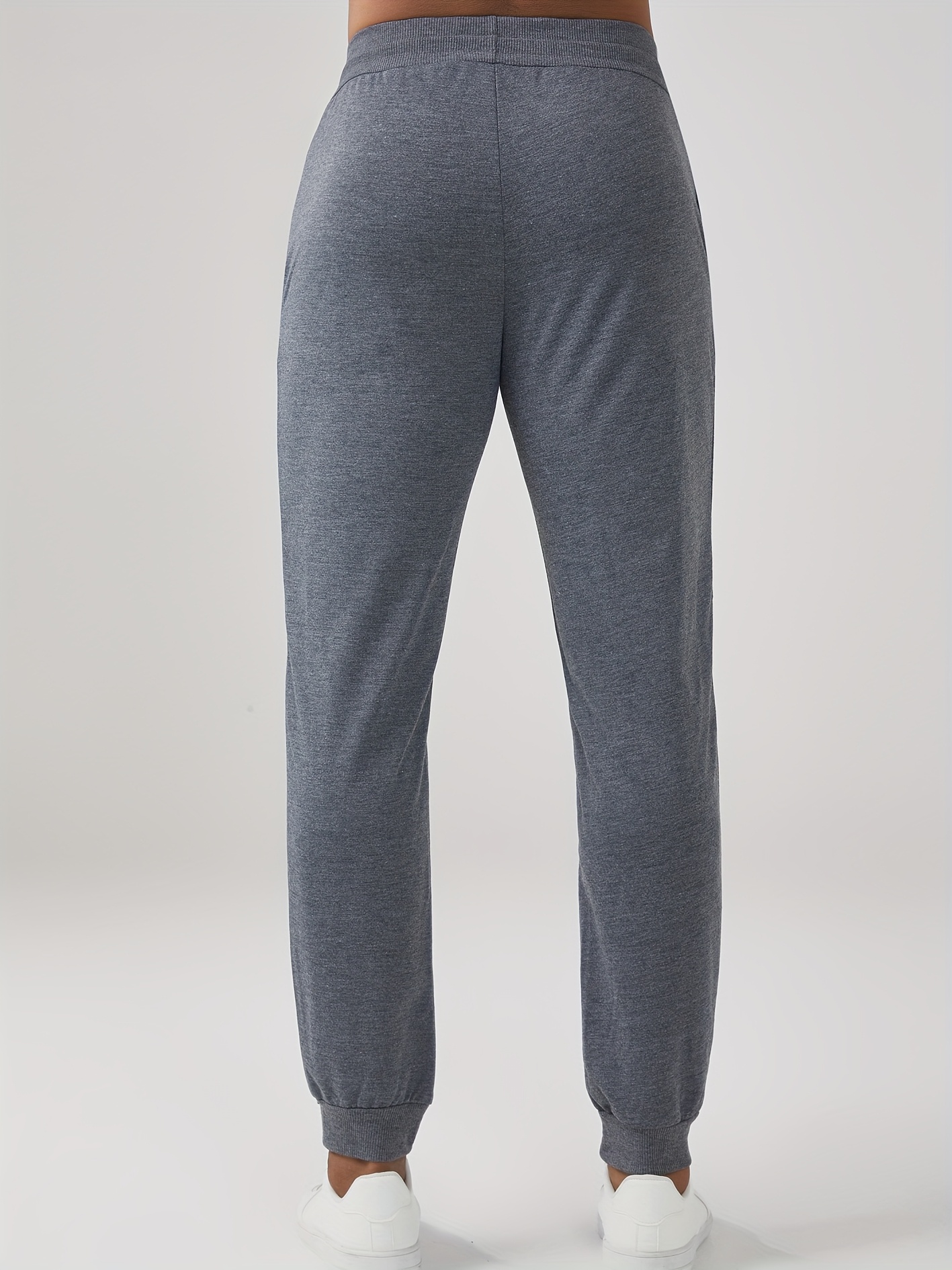 Four-piece set of new Men's casual sports pants, perfect for spring and summer. Made with 100% polyester quick-dry fabric that prevents Light Beige irritation after intense sweating and is durable. Features a slight stretch technology for unrestricted movement during jumping and turning, allowing full freedom in any activity. Ideal for gym workouts, outdoor hiking, daily commuting, rock climbing, city cycling, and fitness training