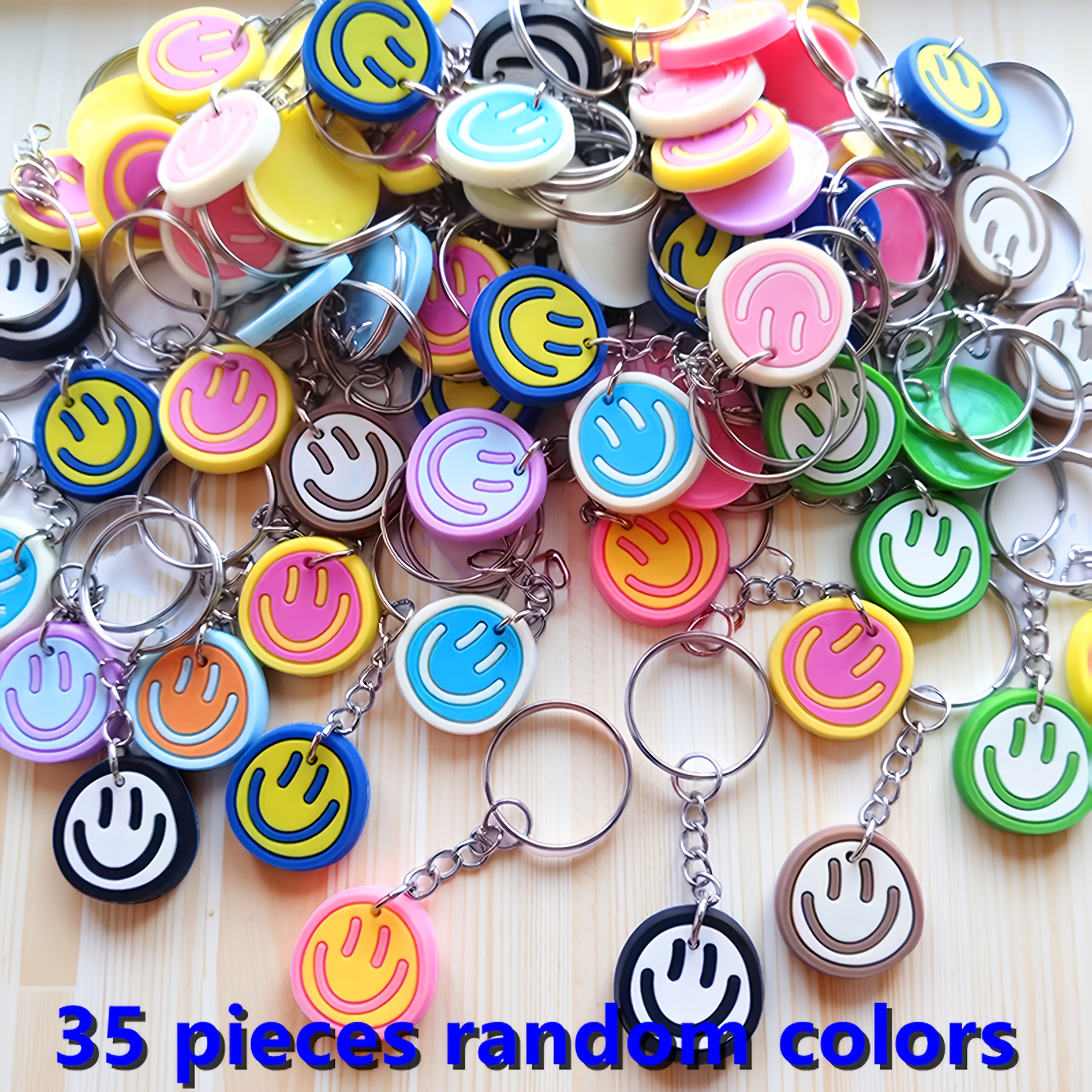 E-shop 35 Zufällige Farben Cartoon PVC Ausdruck Lächelndes Anhänger Schlüsselanhänger Preise Event Party Schlüsselring Mode Süßes Lächelndes Gesicht