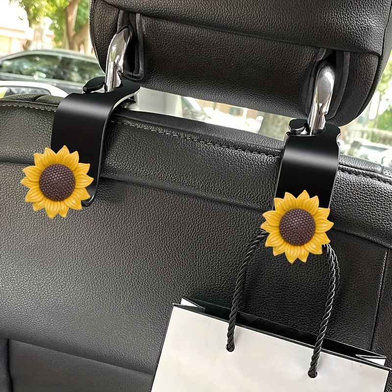 TEMU 2pcs, Sunflower Decorative Multi-functional Hooks For Car Seat Backs, Cute Headrest , Creative Hidden Storage Small Hooks, Fashionable Car Interior Accessories, Universal Type, Festival Gifts.