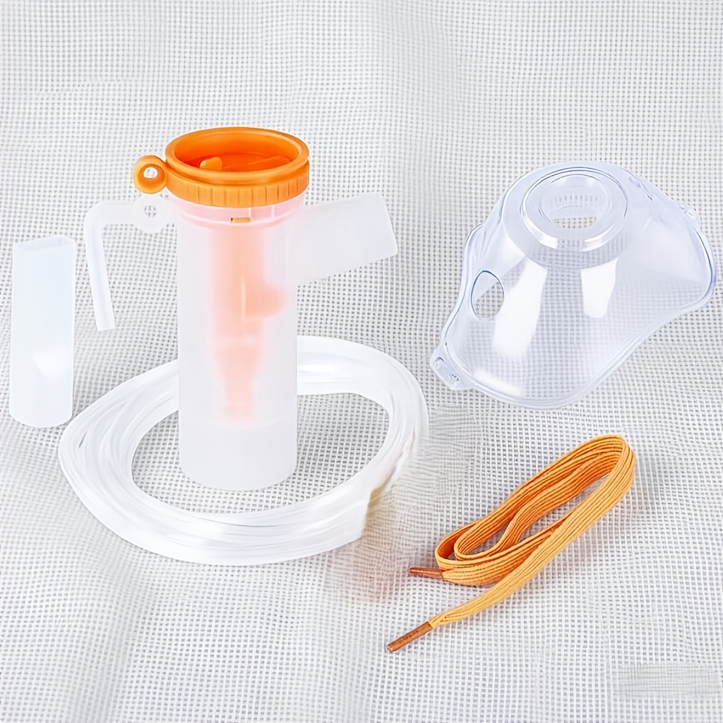 a spray device set with 5 accessories featuring a large blue model and a small   it has two     a mouthpiece and a face mask suitable for pets and household use