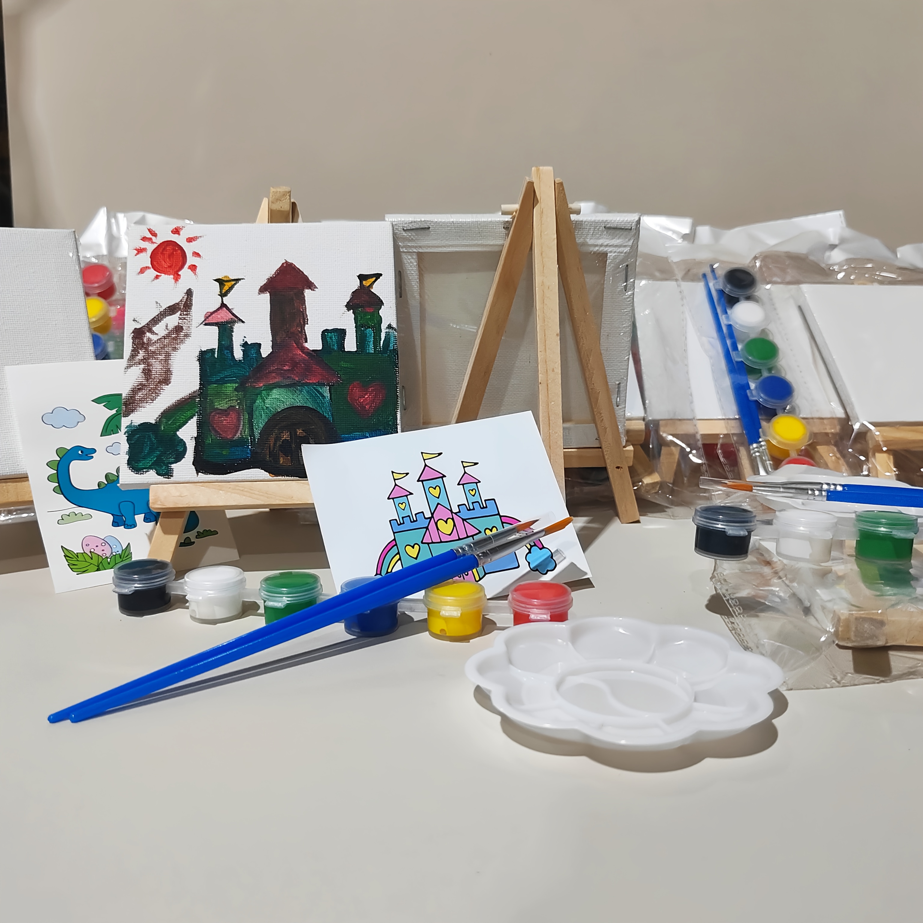 1 set/2 sets of diy   sets, each set   with 2 pen brushes, 6 boxes of paint, 1 easel, 1 drawing board, 1 color palette, and 1 drawing card (the color   of the drawing card are random). suitable for beginners - suitable for  , outdoor sketching, surprise gifts for holidays such as halloween and christmas. 0