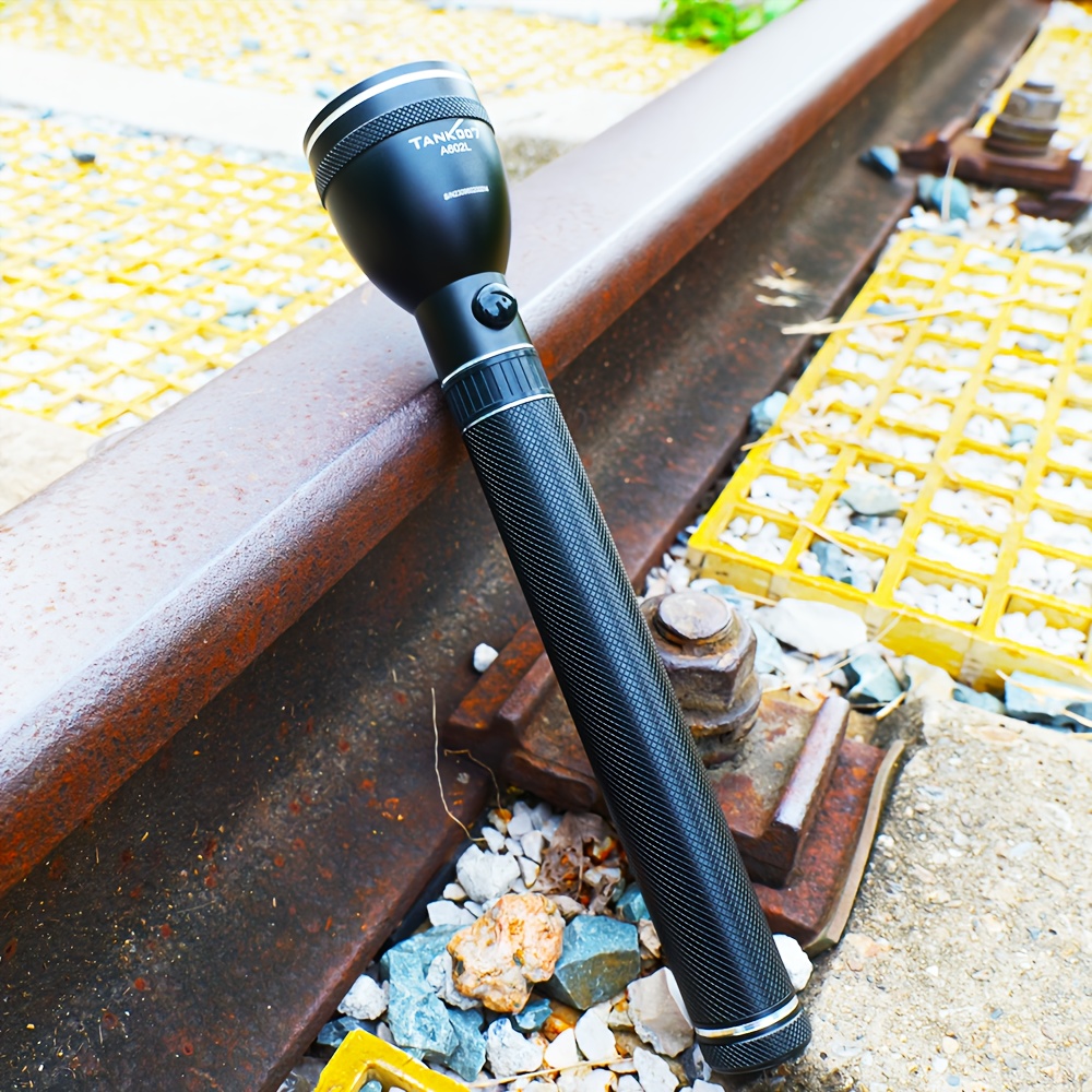 

An Outdoor Flashlight With A Rechargeable 4000mah Battery And Adjustable .