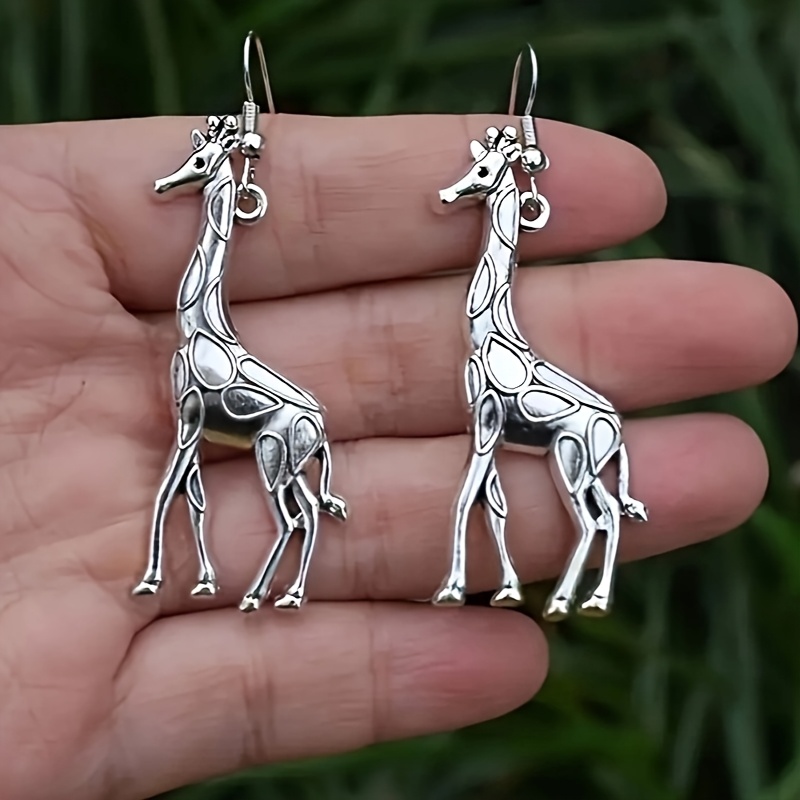 A Pair Of Adorable Bohemian-style Dangling Earrings Featuring Giraffes, Wear And Vacations