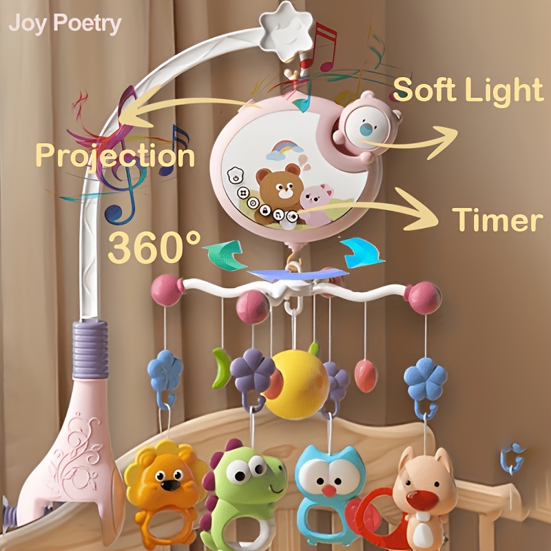 Pink musical crib mobile with projection