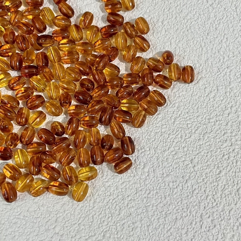 100 Colored Oval Beads for Jewelry Making, 6x9mm