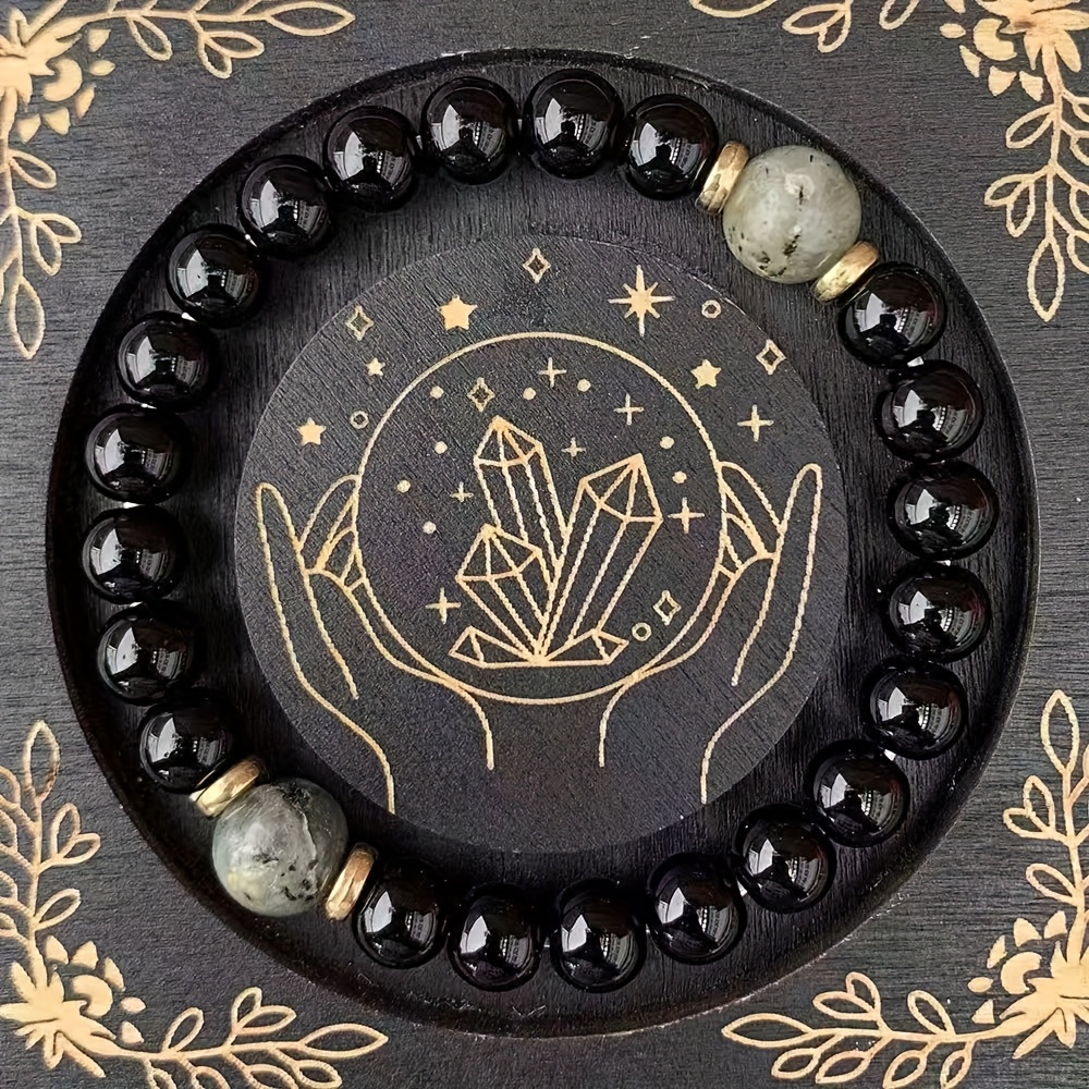 E-shop Ein mächtiges Schutzarmband aus 8 mm schwarzem und Labradorit, das innere Stärke und Gleichgewicht verkörpert. Dieses elastische Armband ist