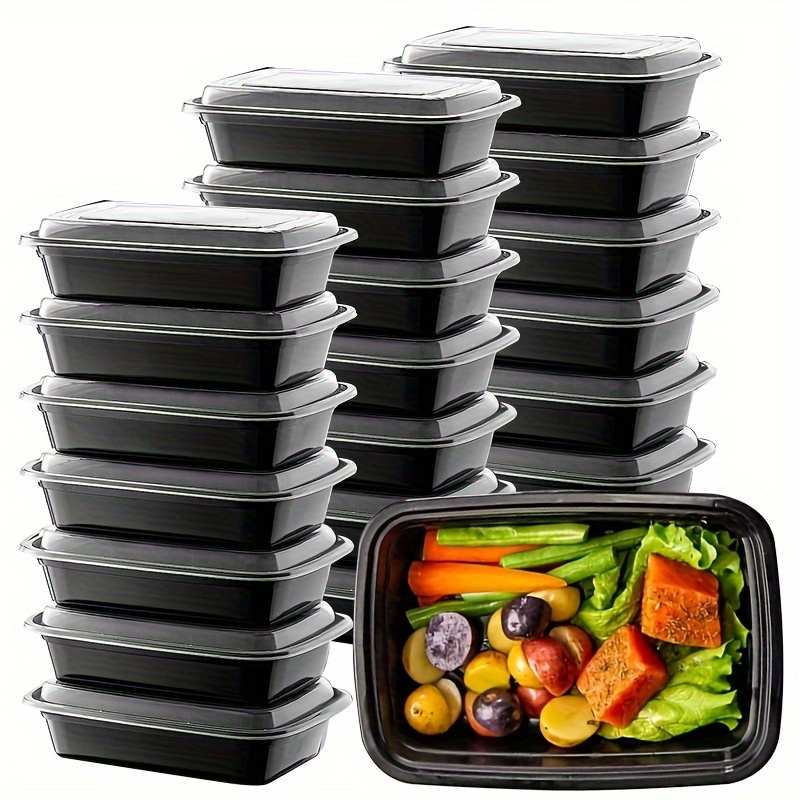 Variedad de comida para llevar en recipientes para microondas con
