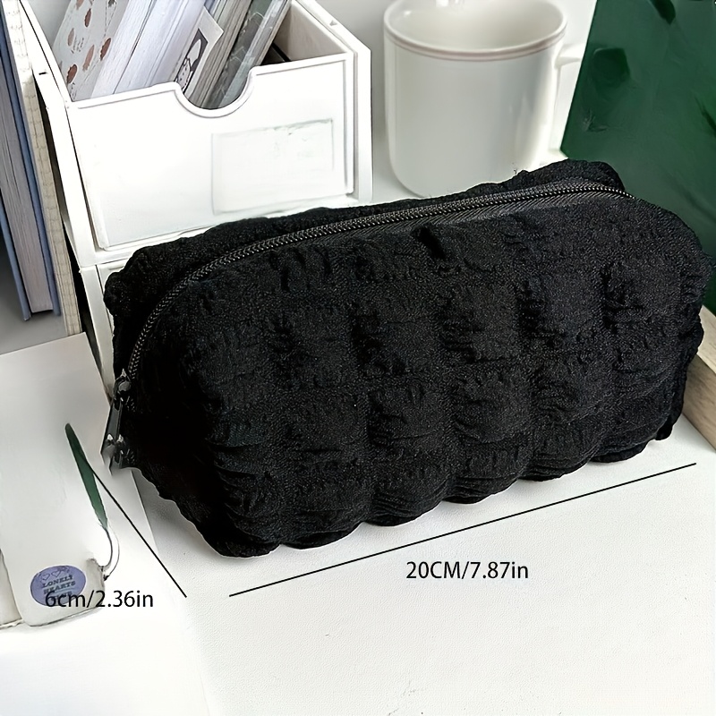 TEMU A Simple Yet Spacious Stationery Storage Bag.