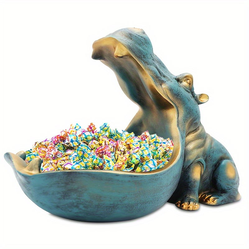 A blue-green hippo bowl with its mouth wide open